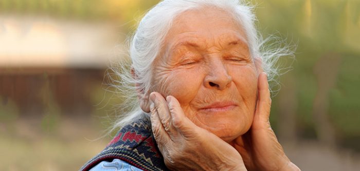 elderly woman thinking