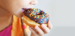 kid eating sugary food
