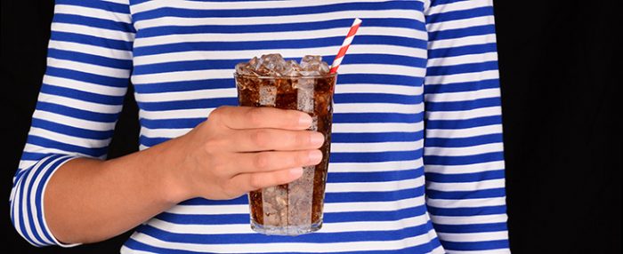 person drinking soda