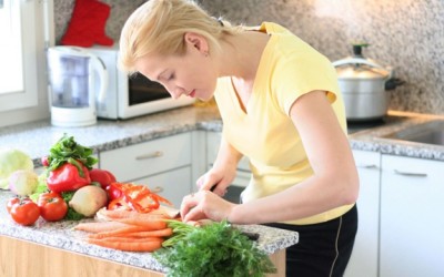 woman cutting vegetables