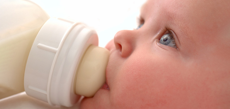 baby drinking baby formula