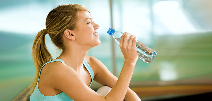 girl drinking water bottle