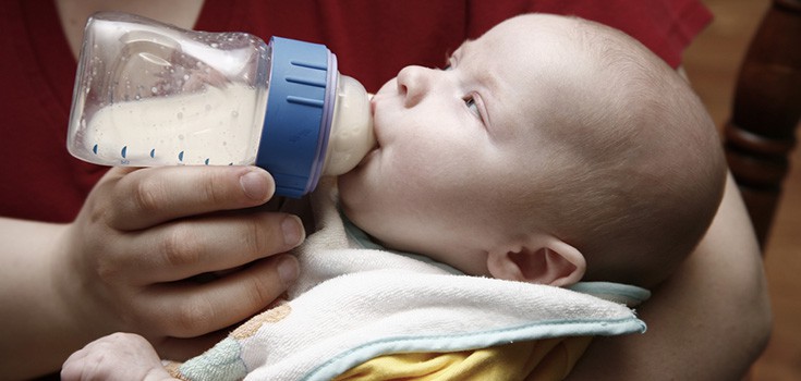 baby drinking infant formula