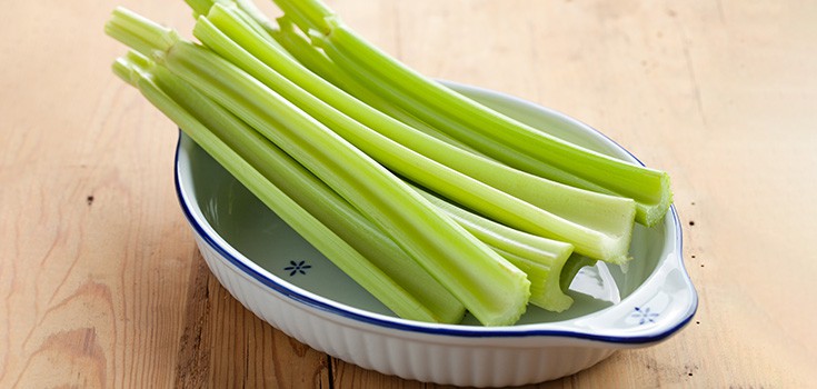 celery sitting in a bowl