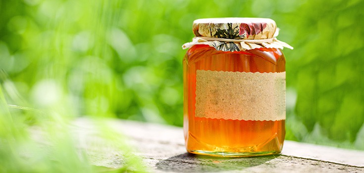 honey jar sitting outside