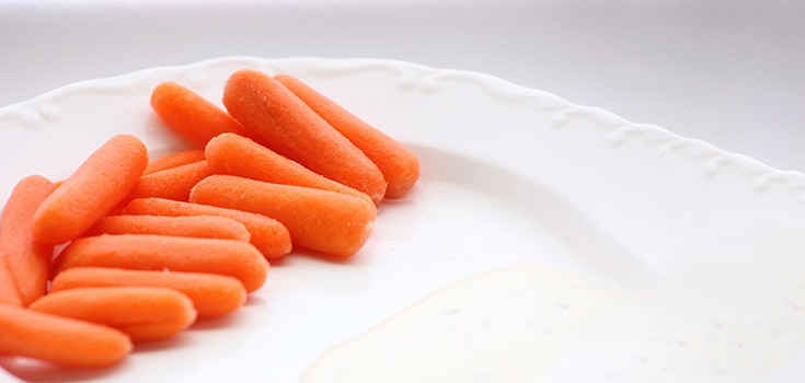 how are baby carrots made