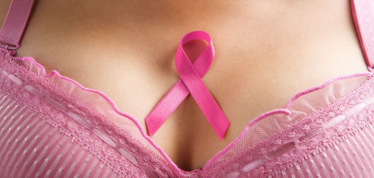 breast cancer ribbon on chest