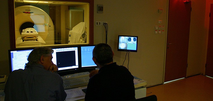 doctors watching CT scan