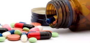 pills spilling out of a bottle