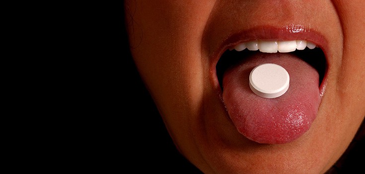 pill on tongue