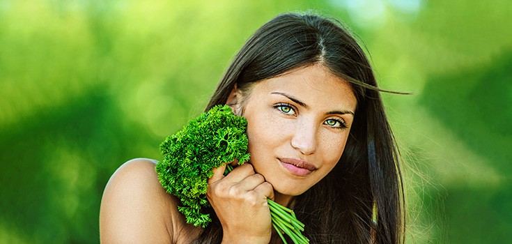 girl with leafy greens