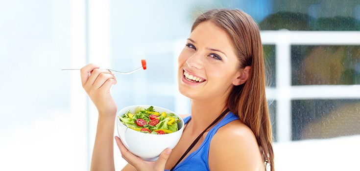 girl eating veggies