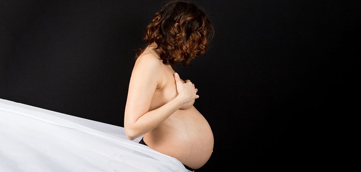 pregnant-woman-dark-735-350