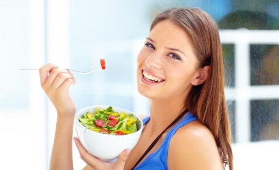 girl eating veggies