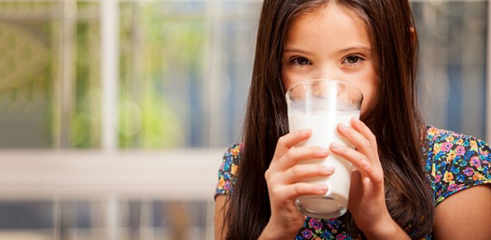 kid drinking raw milk